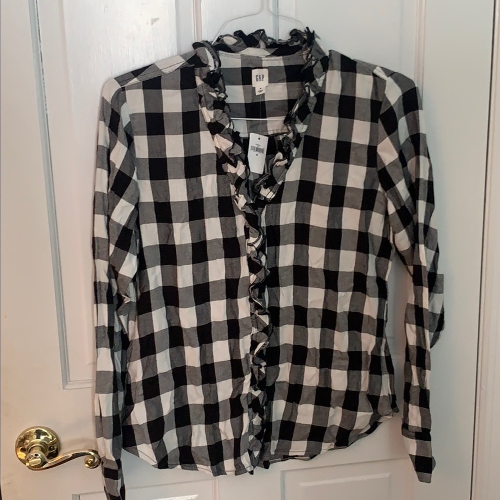 Brand new never worn flannel with ruffled collar.